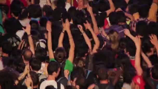 Huge crowd of people dancing during a concert — Stock Video