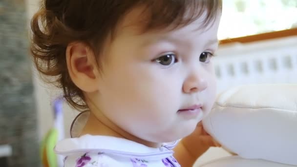 Beautiful little girl portrait in her house — Stock video