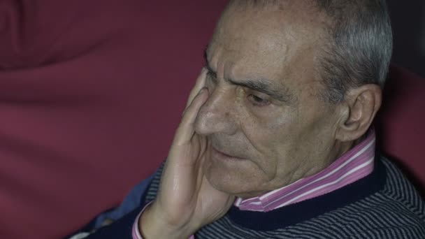 Close up on Sighing elderly man — Αρχείο Βίντεο