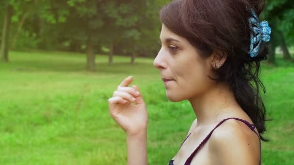 Girl Scratches Her Nose Footage Royalty Free Stock Footage