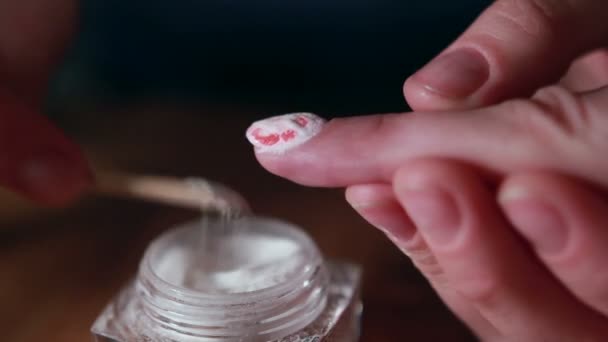 Woman in a Beauty Salon receiving a manicure — Stock Video