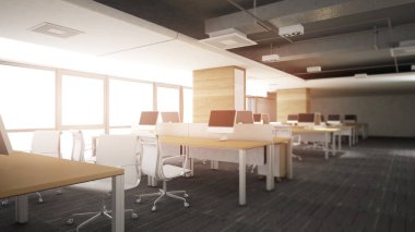 Çalışma alanındaki ofis alanında, koyu gri renkli, halılı ve ahşap çalışma masalı pencerelerden gelen ışık var..