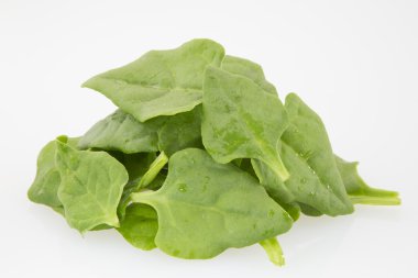 Spinach leaves on white background. clipart