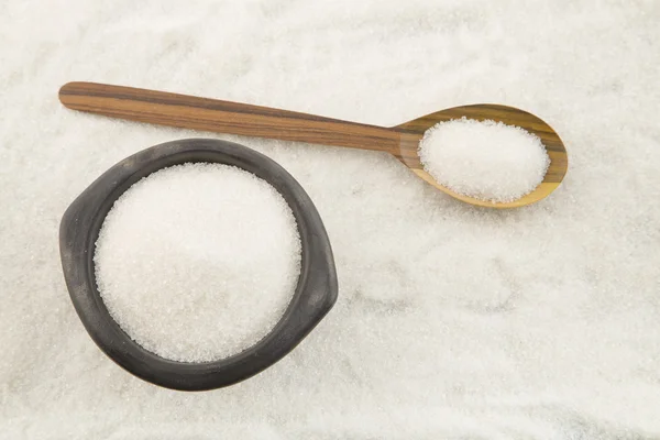 Sugar bowl and wooden spoon — Stock Photo, Image