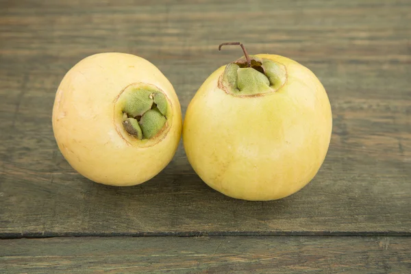 Syzygium Jambos rose apple on wooden background — Stock Photo, Image