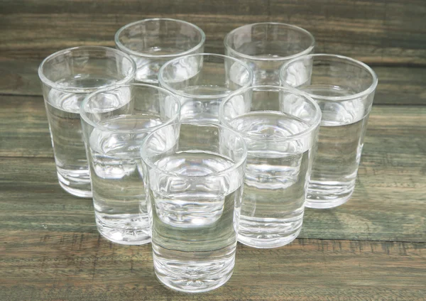 Osm sklenic vody — Stock fotografie