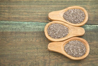 Chia tohum ahşap arka plan üzerinde