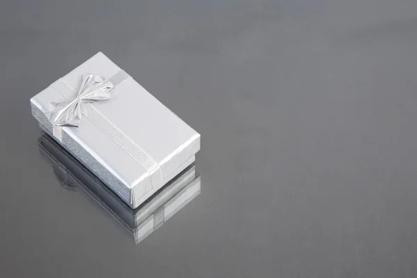 Silver gift box, isolated on neutral background — Stock Photo, Image