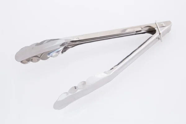 Serving kitchen tongs isolated on a white — Stock Photo, Image
