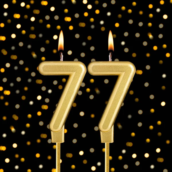 Bulanık ışıklarla siyah arka planda 77 numara - soyut bulanık ışıklı doğum günü kartı