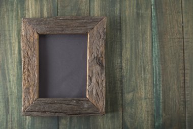 Ahşap arka plan üzerinde ahşap çerçeve