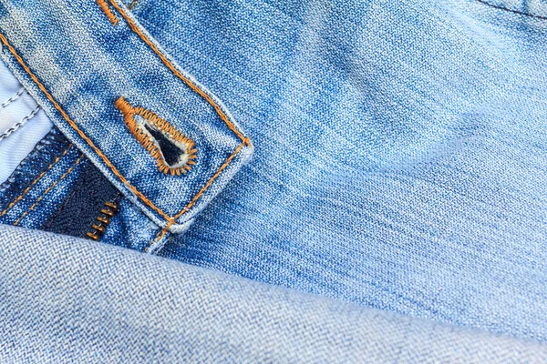 Jeans blu denim texture. texture in tessuto jeans blu. Sfondo jeans. Texture del tessuto blue jeans da vicino con spazio di copia per testo o immagine . — Foto Stock