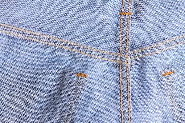 Jeans blu denim texture. texture in tessuto jeans blu. Sfondo jeans. Texture del tessuto blue jeans da vicino con spazio di copia per testo o immagine . — Foto Stock