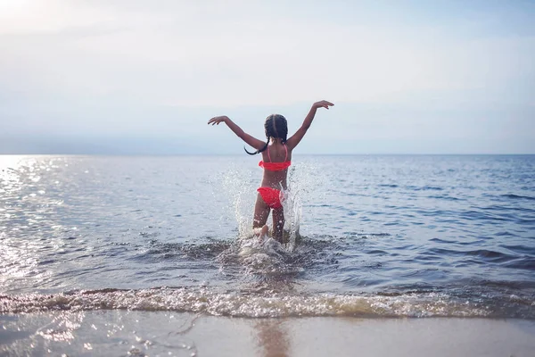 Cute Little Girl Running Sea Sunset Light Lots Splashes Happiness — Stock Photo, Image