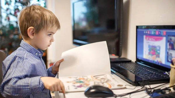 Distant education, online class meeting. Preschool boy studying during online lesson at home — Stock Photo, Image