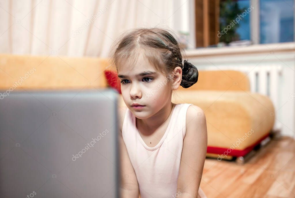 Young ballerina talking with dance classmates after online ballet class at home, social distance