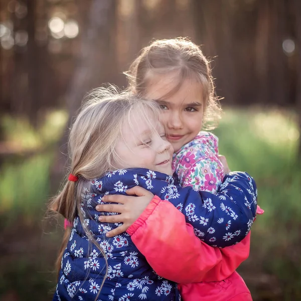 Cute Girl Hugging Her Small Sister Love Tenderness Walking Forest — Stock Photo, Image