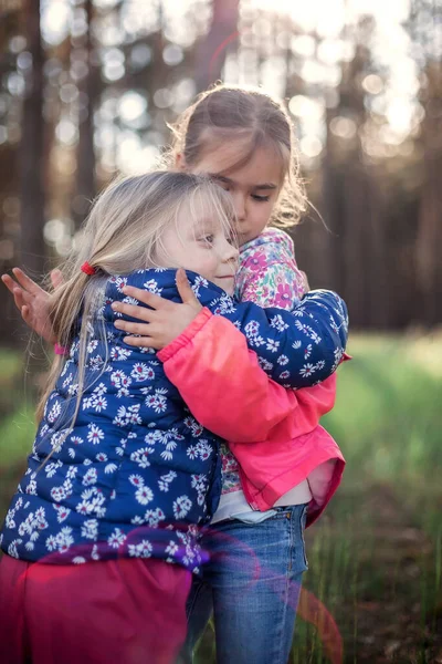 Cute Girl Hugging Her Small Sister Love Tenderness Walking Forest — Stock Photo, Image