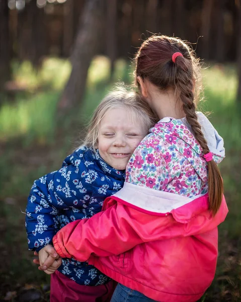Cute Girl Hugging Her Small Sister Love Tenderness Walking Forest — Stock Photo, Image