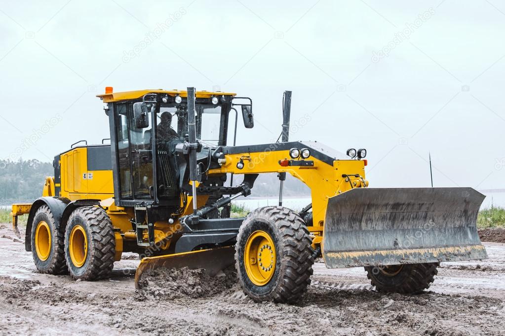 Road grader - heavy earth moving dirty