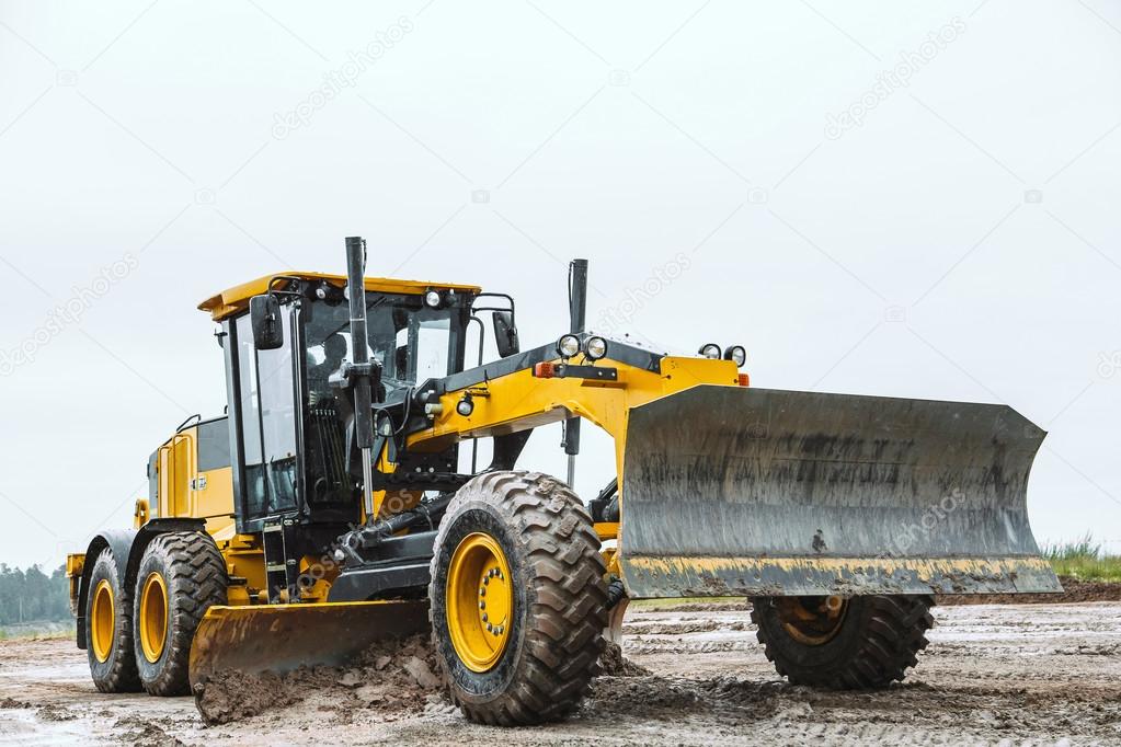 Road grader - heavy earth moving dirty