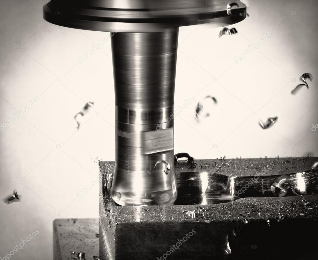 Milling cutter work with splinters flying off, monochrome version