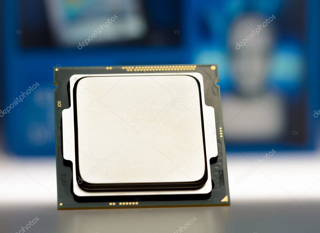 modern eight or four-core processor on original packaging background