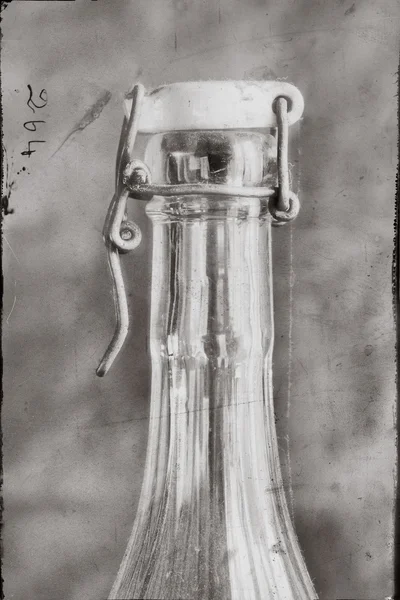 Throat old dusty bottles of lemonade with a ceramic cap, monochrome version with the adjustment in the style of contemporary photographs, — Stock Photo, Image