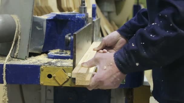 Carpenter works for the machine — Stock Video