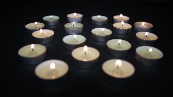 Small candles burning on the table — Stock Video