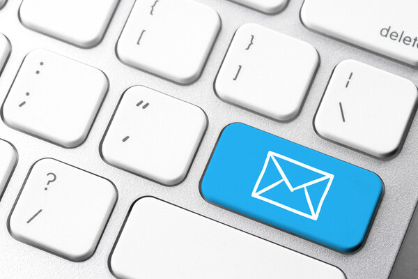 Email & contact us icon on computer keyboard
