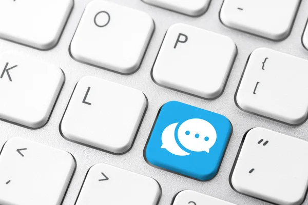 Social media & chat icon on computer keyboard