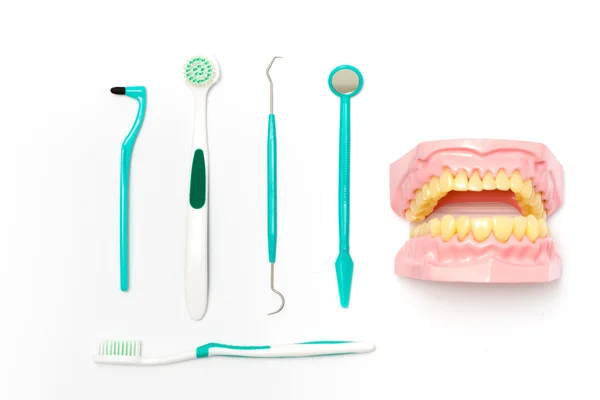 Escova de dentes e pasta de dentes de vista superior — Fotografia de Stock