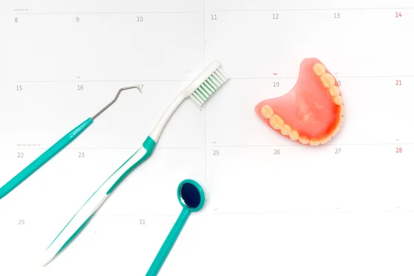 Tandenborstel en tandpasta van bovenaanzicht — Stockfoto