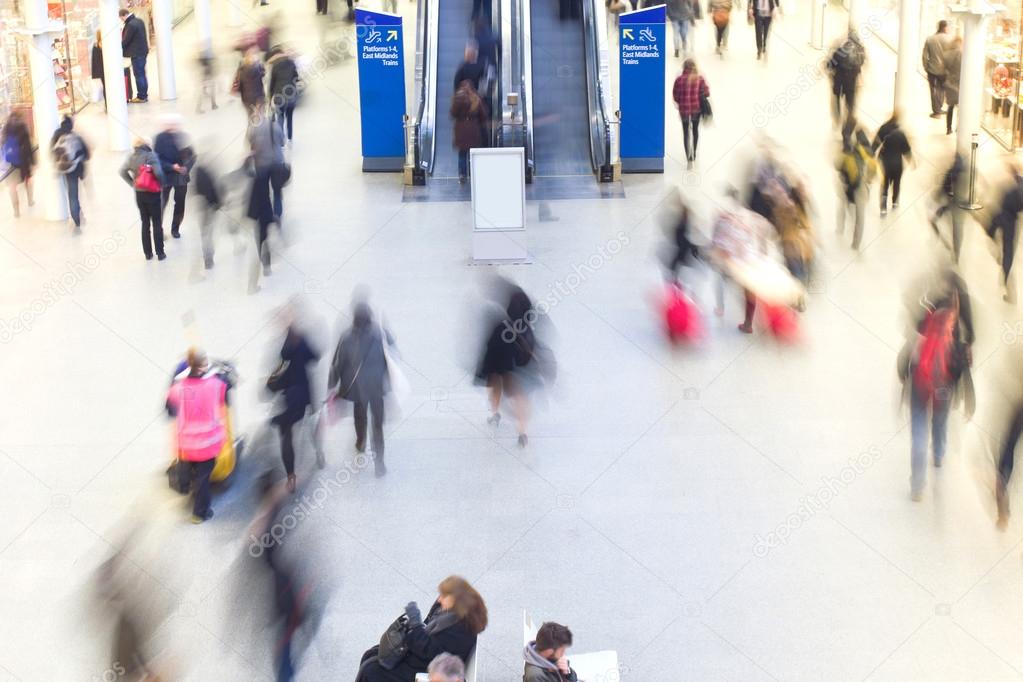 London Train Tube station Blur people movement in rush hour