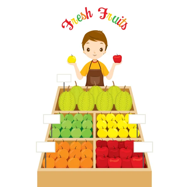 Hombre Shopkeeper con un montón de frutas en la tienda — Vector de stock