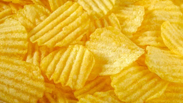 Chips, potatis mat bakgrund — Stockfoto