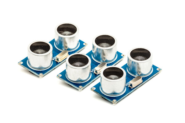 Three ultrasonic range finders isolated on white