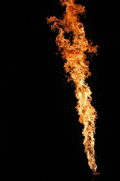 Fire artist performing fire breathing — Stock Photo, Image