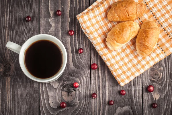 Pequeños croissants y taza de café —  Fotos de Stock