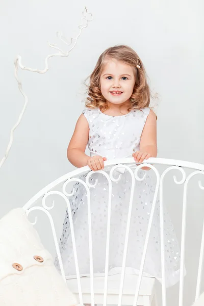 Cute, funny little girl in white — Stock Photo, Image