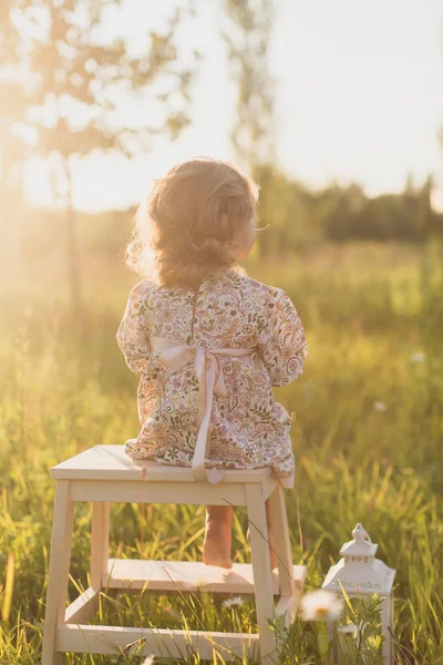 Little girl on the nature,  sunset — Stock Fotó