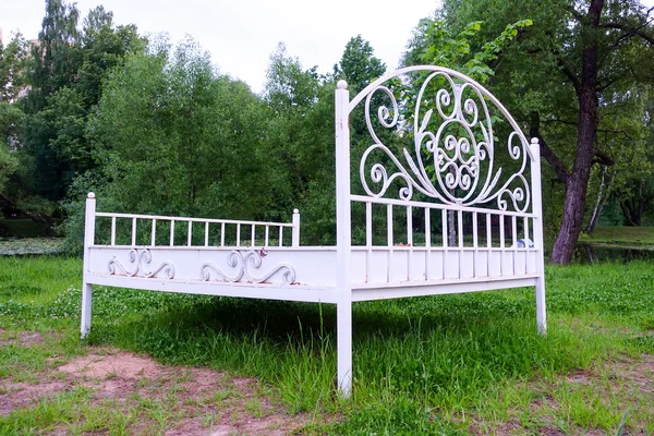 Iron bed on the street