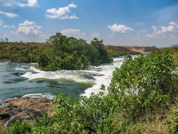 Vista de los rápidos del río Victoria Nile. Jinja, Uganda . Imágenes De Stock Sin Royalties Gratis