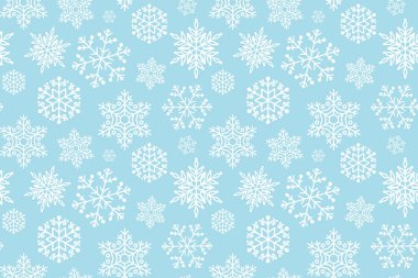 Mavi Noel arkaplanı ve kar taneleri. Kış ve Noel teması için kusursuz kar taneleri arka planı.