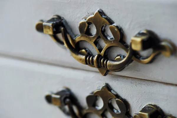 Brass handle on a box closeup — Stock Photo, Image