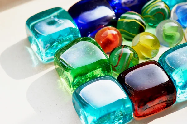 Colorful glass  square and round stones. — Stock Photo, Image