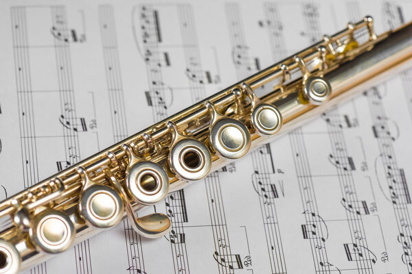 Flute on a musical score