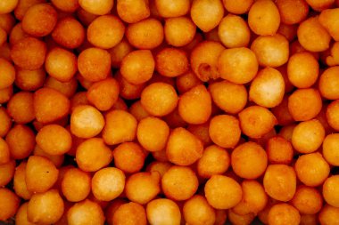 Lezzetli peynir topları aromalı tam çerçeve arkaplan dokusu yaratıyor