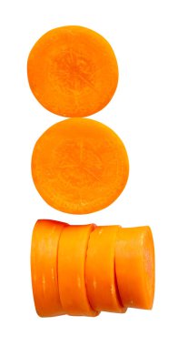 Side view of orange carrot slices in stack and set is isolated on white background with clipping path.